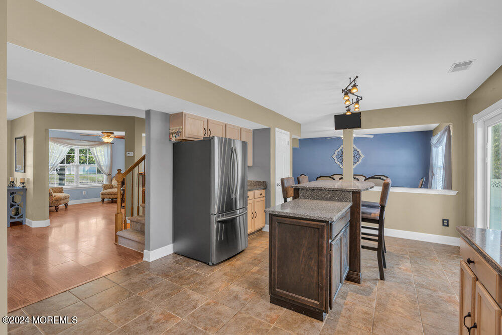 7 Andrew Street Howell, NJ 07731 - Photo 27 of 57 a kitchen that has a table and chairs in it