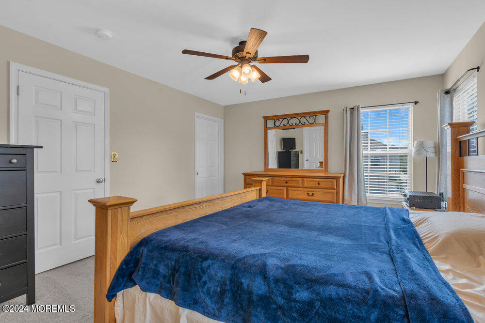 7 Andrew Street Howell, NJ 07731 - Photo 33 of 57 a bedroom with a bed and window