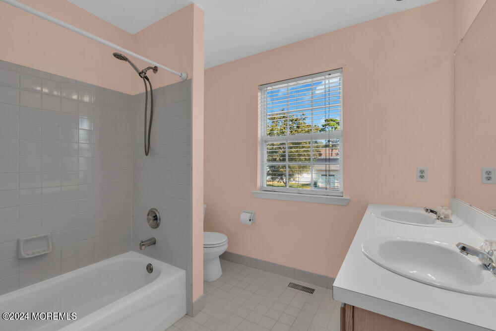 7 Andrew Street Howell, NJ 07731 - Photo 39 of 57 a bathroom with a sink toilet and shower