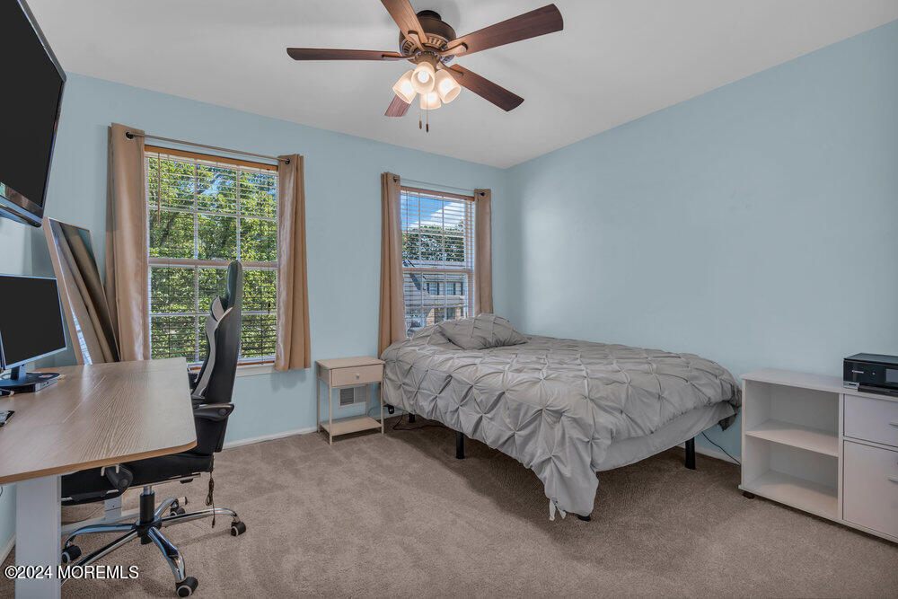 7 Andrew Street Howell, NJ 07731 - Photo 41 of 57 a bedroom with a bed window and a desk