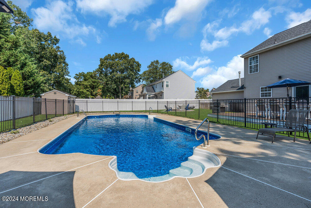 7 Andrew Street Howell, NJ 07731 - Photo 47 of 57 a view of swimming pool with seating space