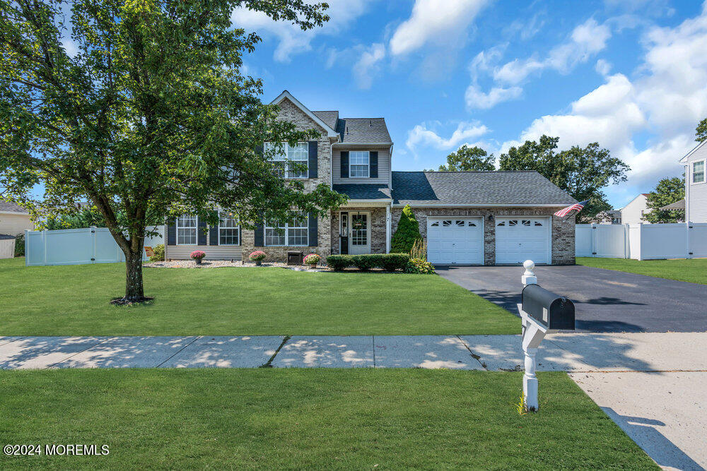 7 Andrew Street Howell, NJ 07731 - Photo 7 of 57 a front view of a house with a yard