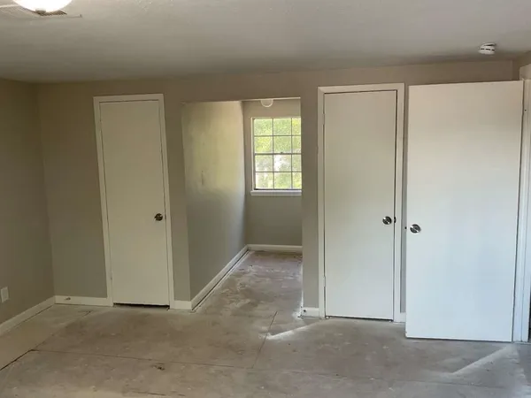 an empty room with windows