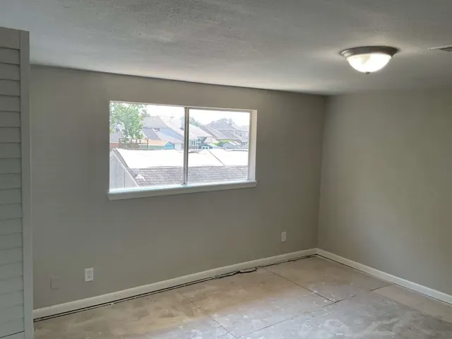 an empty room with a window