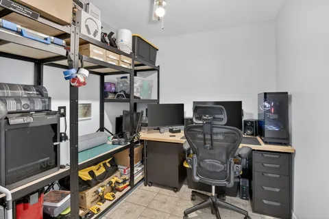 a view of a workspace with furniture
