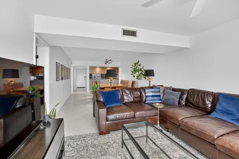 a living room with furniture and a couch