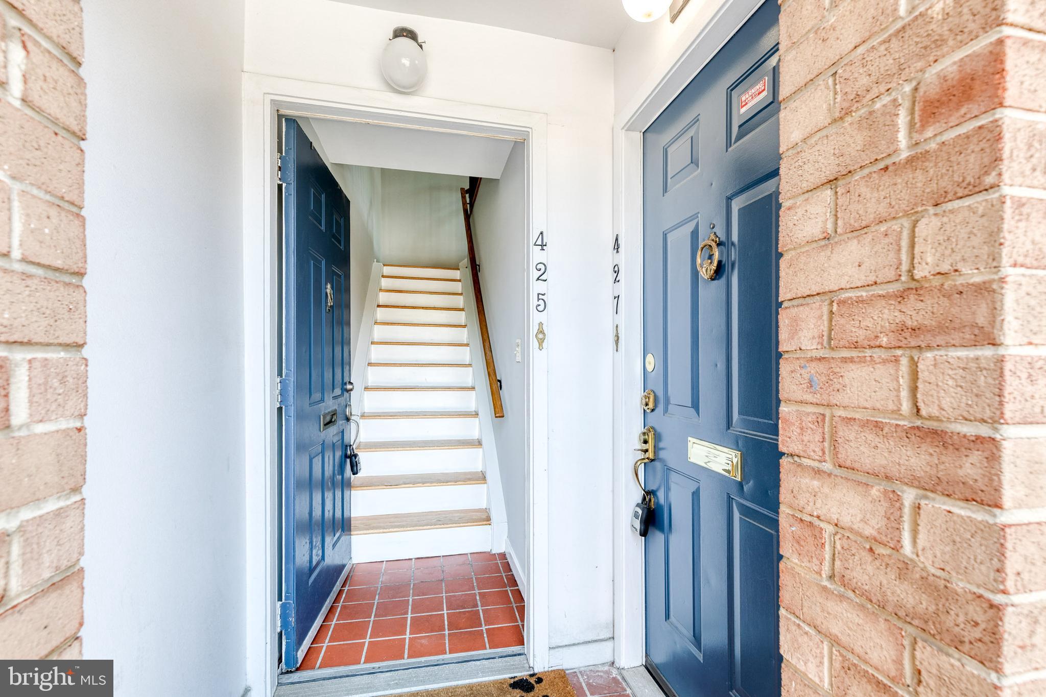 425 South Sharp Street, Unit R 15 Baltimore, MD 21201 - Photo 2 of 29 a view of a hallway with windows