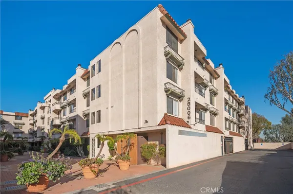 a view of a building with a street