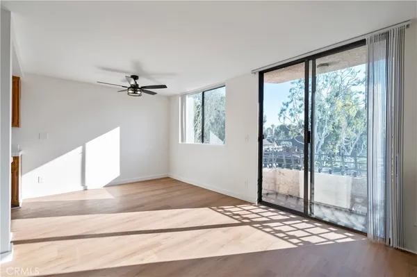 a view of a yard with cars parked