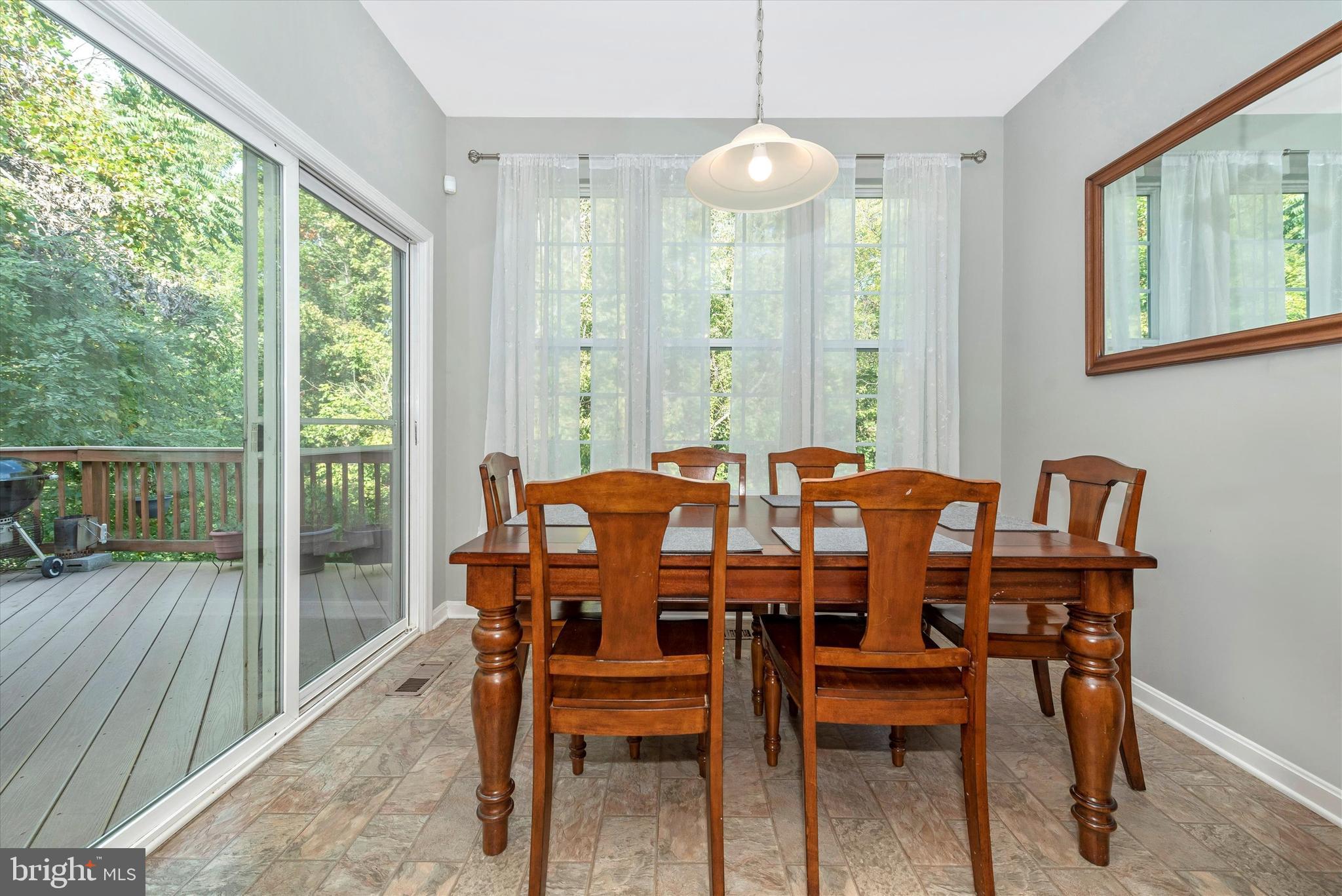 2187 Swains Lock Court Point of Rocks, MD 21777 - Photo 14 of 36 Large breakfast room leading to rear deck.
