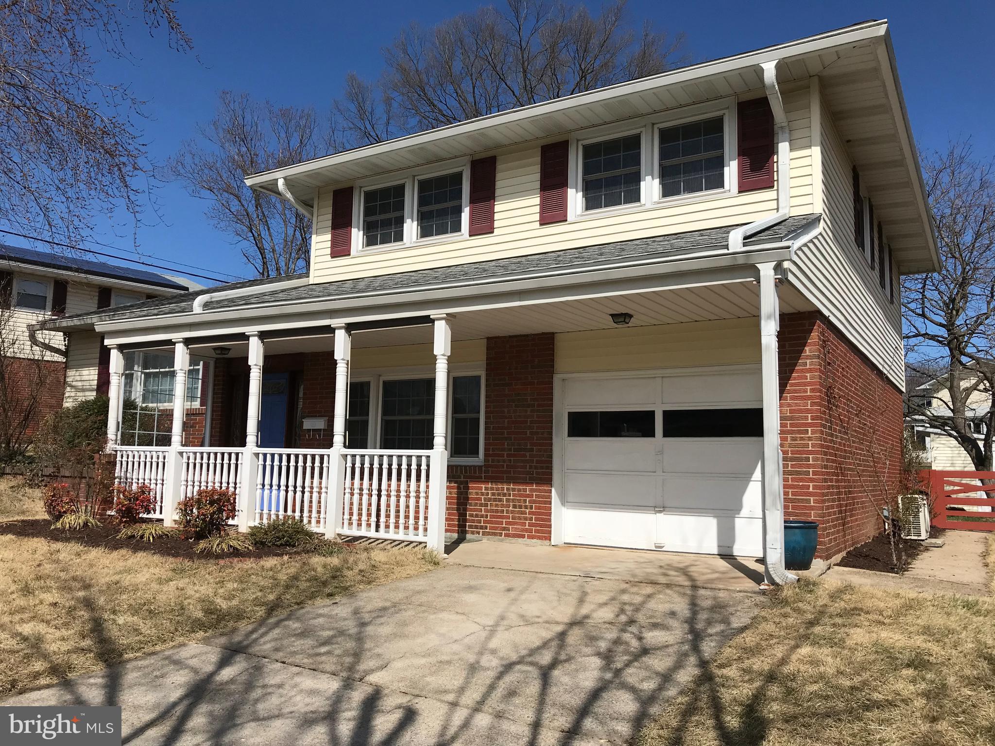 8411 Coco Road Baltimore, MD 21237 - Photo 1 of 23 a house with yard in front of it