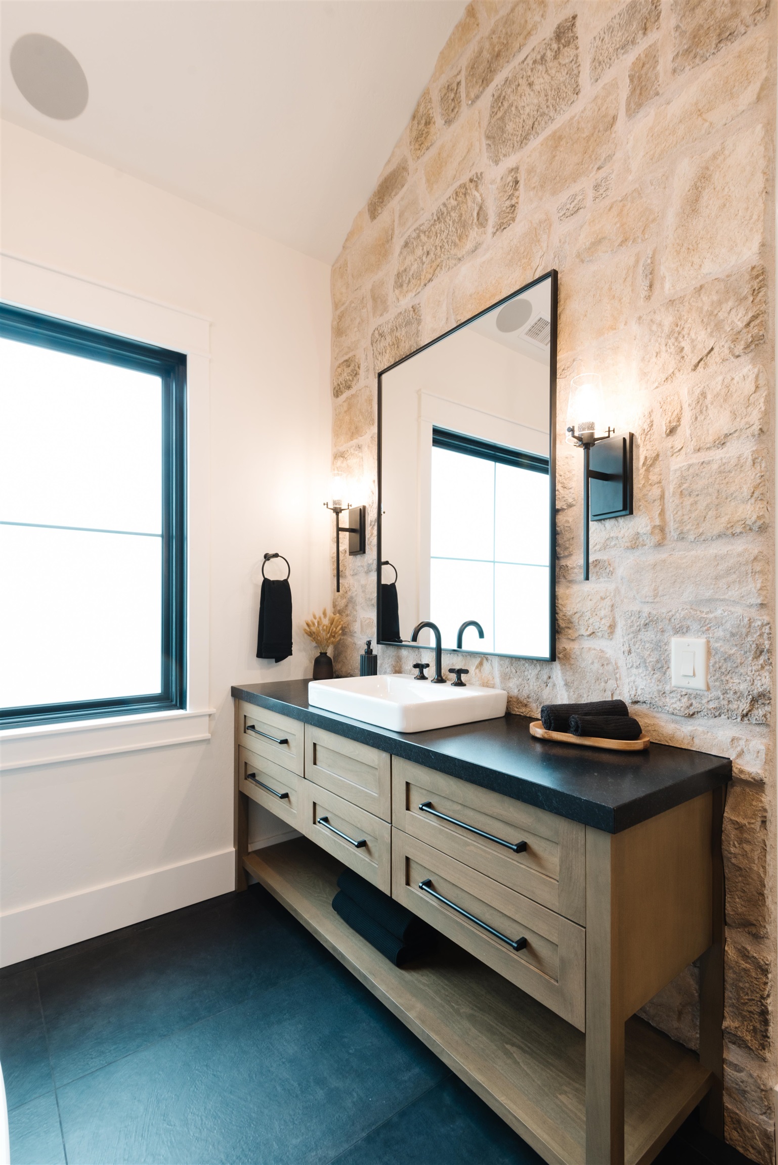 983 Farm House Road Grand Junction, CO 81505 - Photo 19 of 34 a bathroom with a sink and a mirror