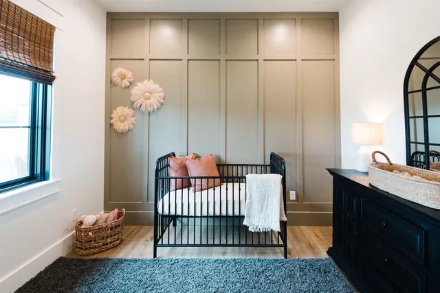 a view of a bedroom with furniture and rug