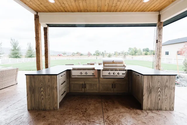 an aerial view of a house with a ocean view