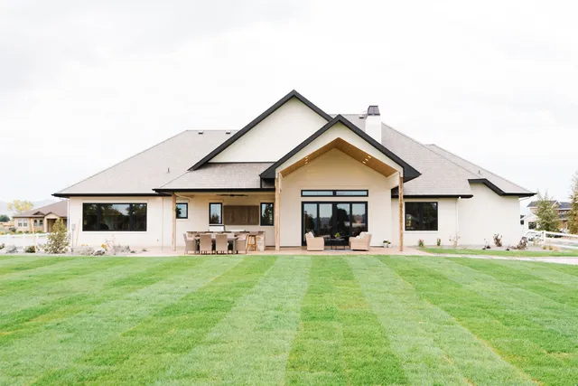 a front view of house with yard and green space