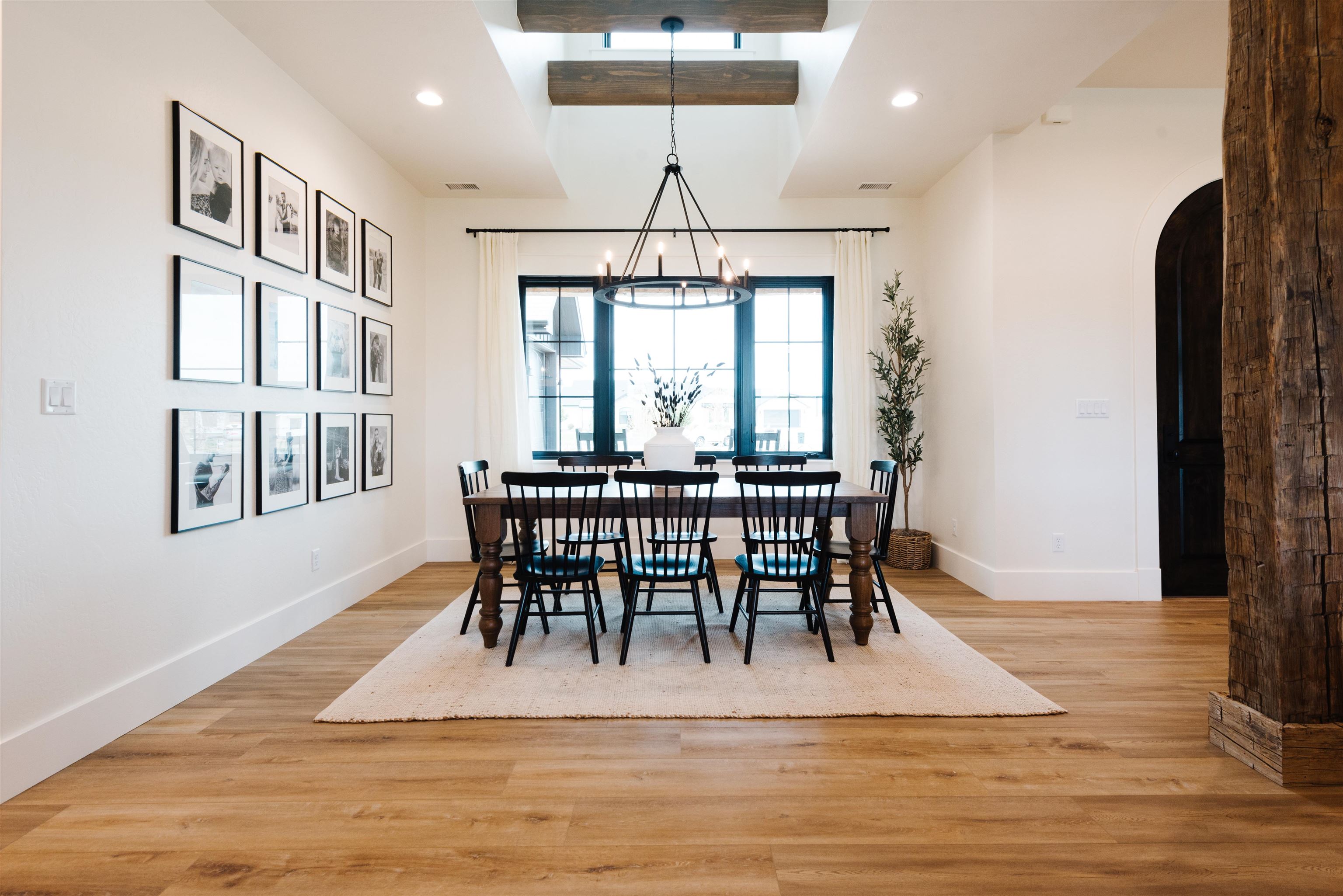 983 Farm House Road Grand Junction, CO 81505 - Photo 6 of 34 a dining room with furniture a chandelier and wooden floor