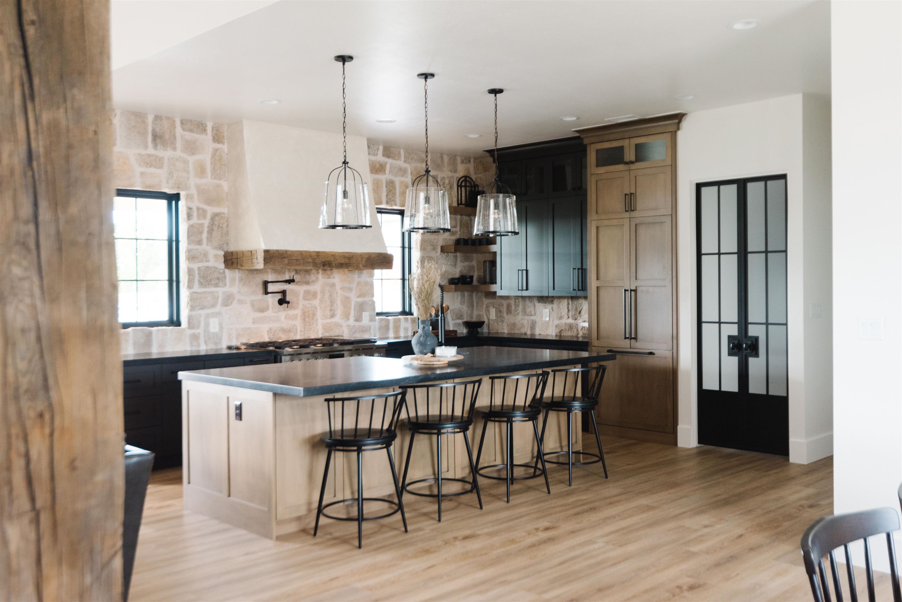 983 Farm House Road Grand Junction, CO 81505 - Photo 8 of 34 a kitchen with stainless steel appliances granite countertop a sink a stove a refrigerator and wooden floor