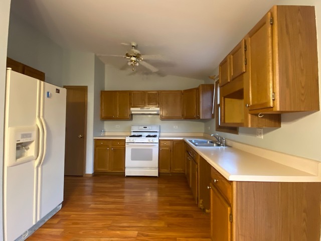 4017 Ridge Road Zion, IL 60099 - Photo 6 of 18 a kitchen with a refrigerator sink and stove