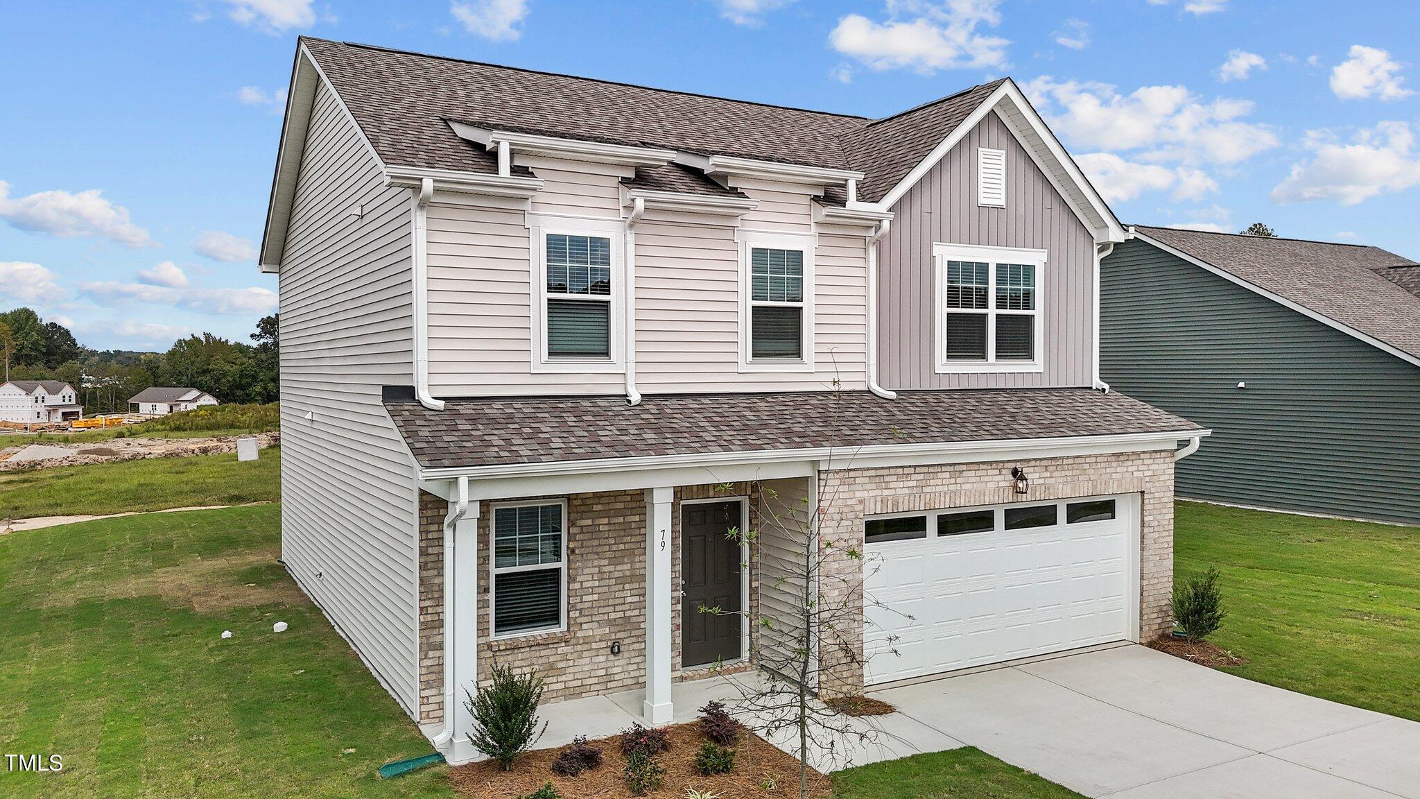 79 Club Road Louisburg, NC 27549 - Photo 3 of 32 5-web-or-mls-DJI_20240923133852_0044_D