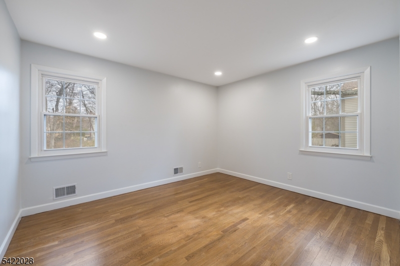 6 Windsor Way Berkeley Heights, NJ 07922 - Photo 26 of 36 an empty room with windows