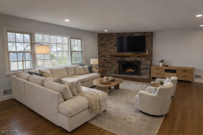 6 Windsor Way Berkeley Heights, NJ 07922 - Photo 4 of 36 a living room with furniture and a fireplace