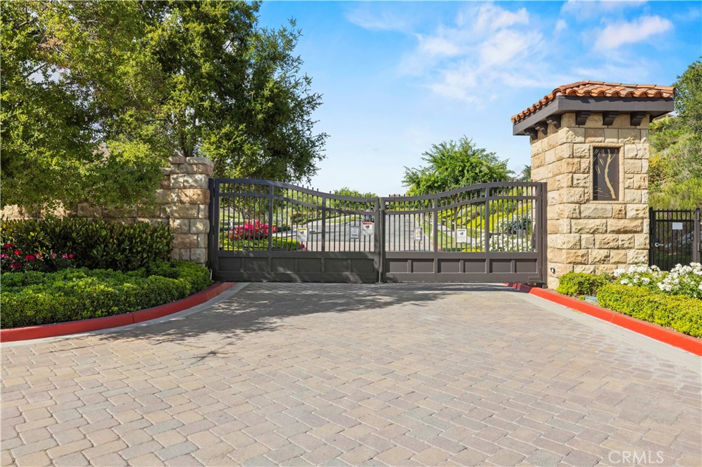 28319 Chisel Court Valencia, CA 91354 - Photo 2 of 74 Gated Entrance to West Hills