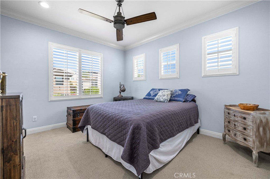 28319 Chisel Court Valencia, CA 91354 - Photo 29 of 74 a spacious bedroom with a bed and a window