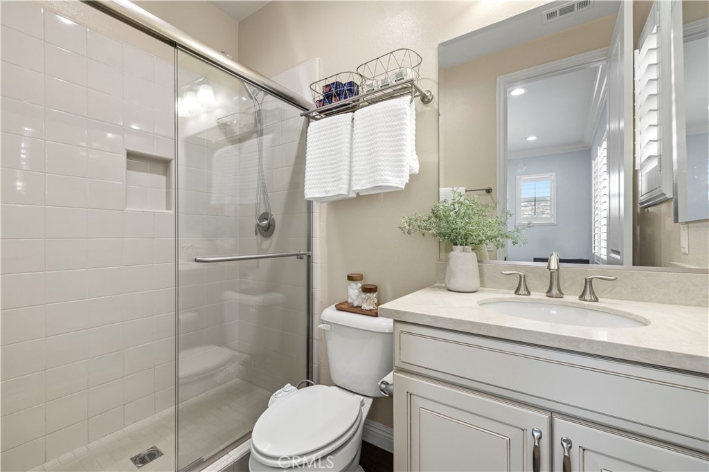 28319 Chisel Court Valencia, CA 91354 - Photo 32 of 74 a bathroom with a sink toilet and shower