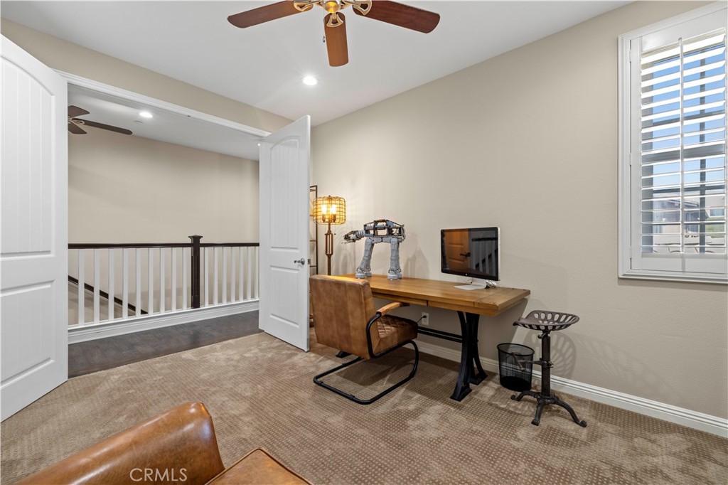 28319 Chisel Court Valencia, CA 91354 - Photo 34 of 74 a view of a workspace with furniture and a window