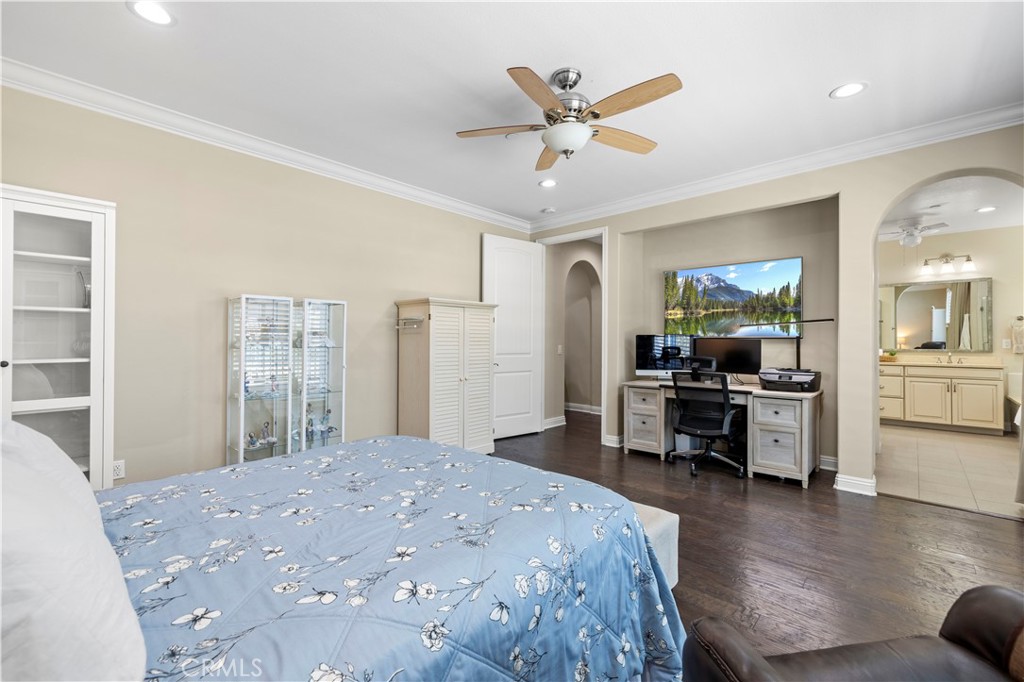 28319 Chisel Court Valencia, CA 91354 - Photo 37 of 74 a bedroom with a bed and a large mirror