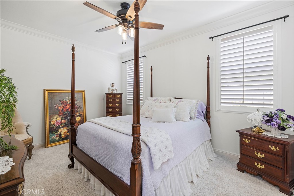 28319 Chisel Court Valencia, CA 91354 - Photo 50 of 74 a bedroom with a bed and a chandelier