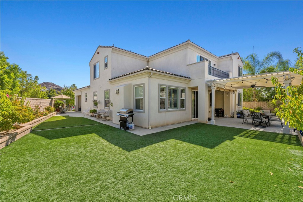28319 Chisel Court Valencia, CA 91354 - Photo 57 of 74 a view of a house with a yard and sitting area