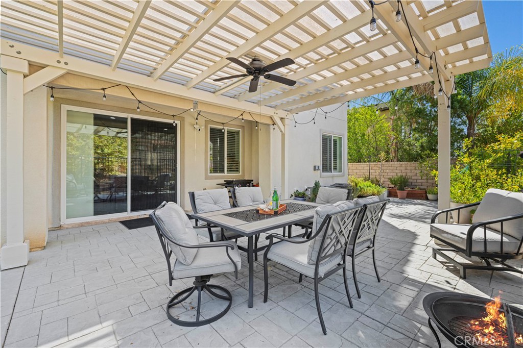 28319 Chisel Court Valencia, CA 91354 - Photo 58 of 74 a dining room with furniture and wooden floor