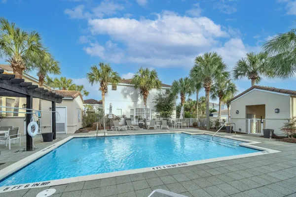 a view of a swimming pool with a patio