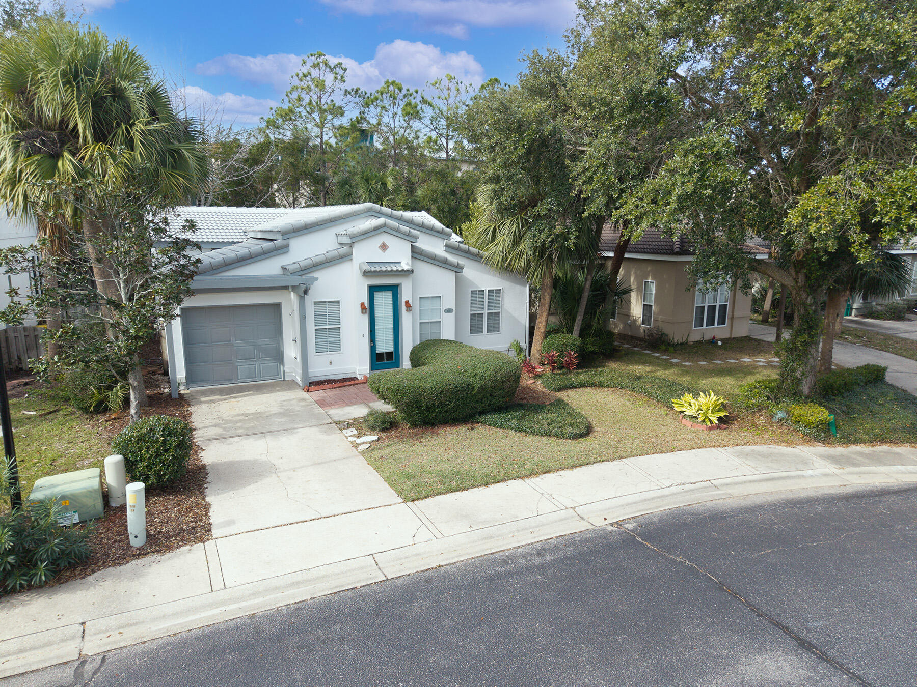 108 Mantero Way Destin, FL 32541 - Photo 10 of 36 a view of a house with a yard and large tree