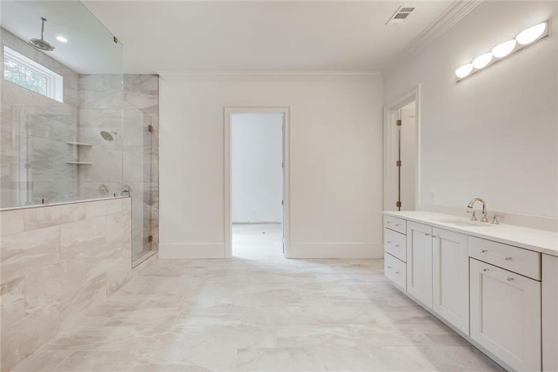201 Westminster Drive Athens, GA 30607 - Photo 62 of 85 a bathroom with a sink a toilet and shower