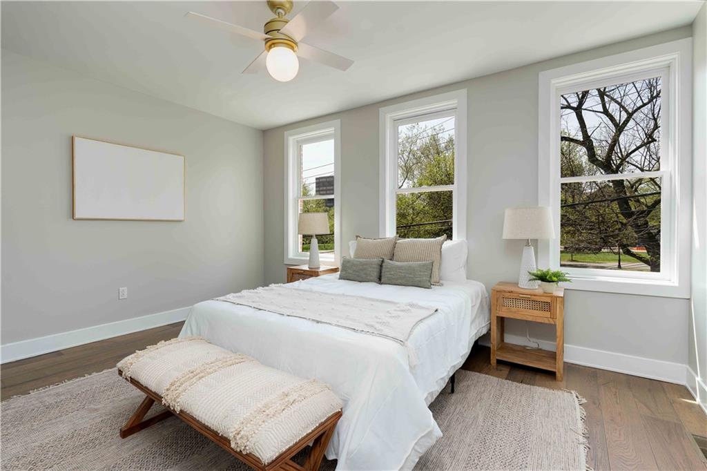 712 Cedar Avenue Pittsburgh, PA 15212 - Photo 12 of 25 a bedroom with a bed and a window