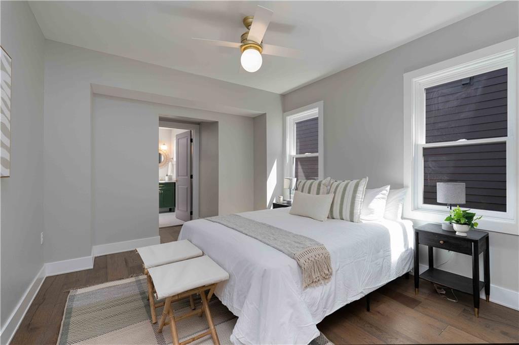 712 Cedar Avenue Pittsburgh, PA 15212 - Photo 15 of 25 a bedroom with a bed furniture and a window