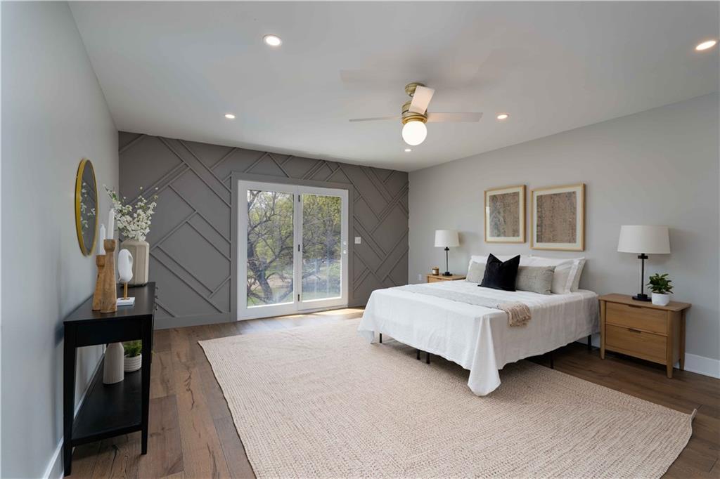 712 Cedar Avenue Pittsburgh, PA 15212 - Photo 21 of 25 a spacious bedroom with a large bed and a window