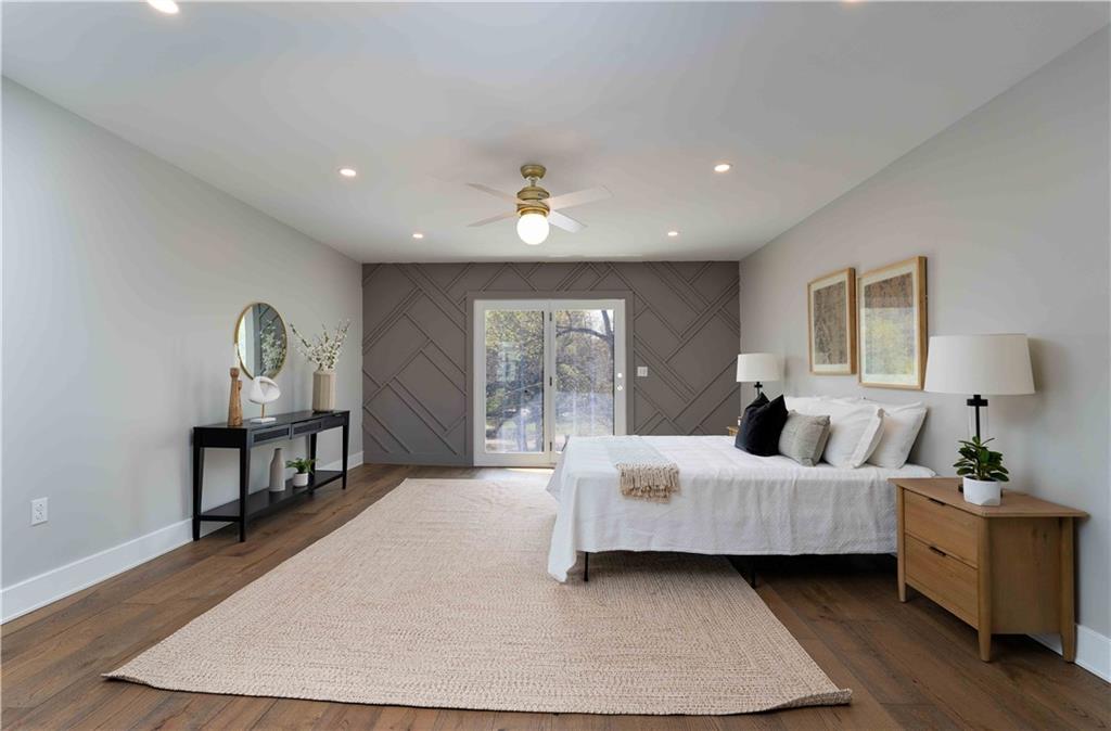712 Cedar Avenue Pittsburgh, PA 15212 - Photo 22 of 25 a bedroom with furniture and wooden floor