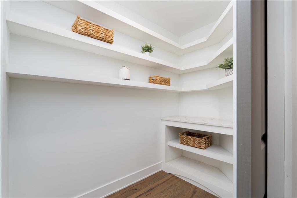 712 Cedar Avenue Pittsburgh, PA 15212 - Photo 6 of 25 a hallway with a wooden floor