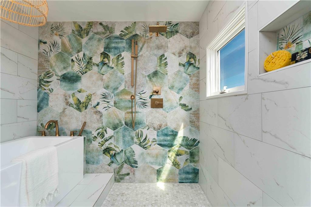 712 Cedar Avenue Pittsburgh, PA 15212 - Photo 8 of 25 a bath tub with a shower curtain