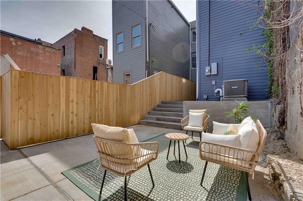 712 Cedar Avenue Pittsburgh, PA 15212 - Photo 10 of 25 a view of a patio with a table and chairs