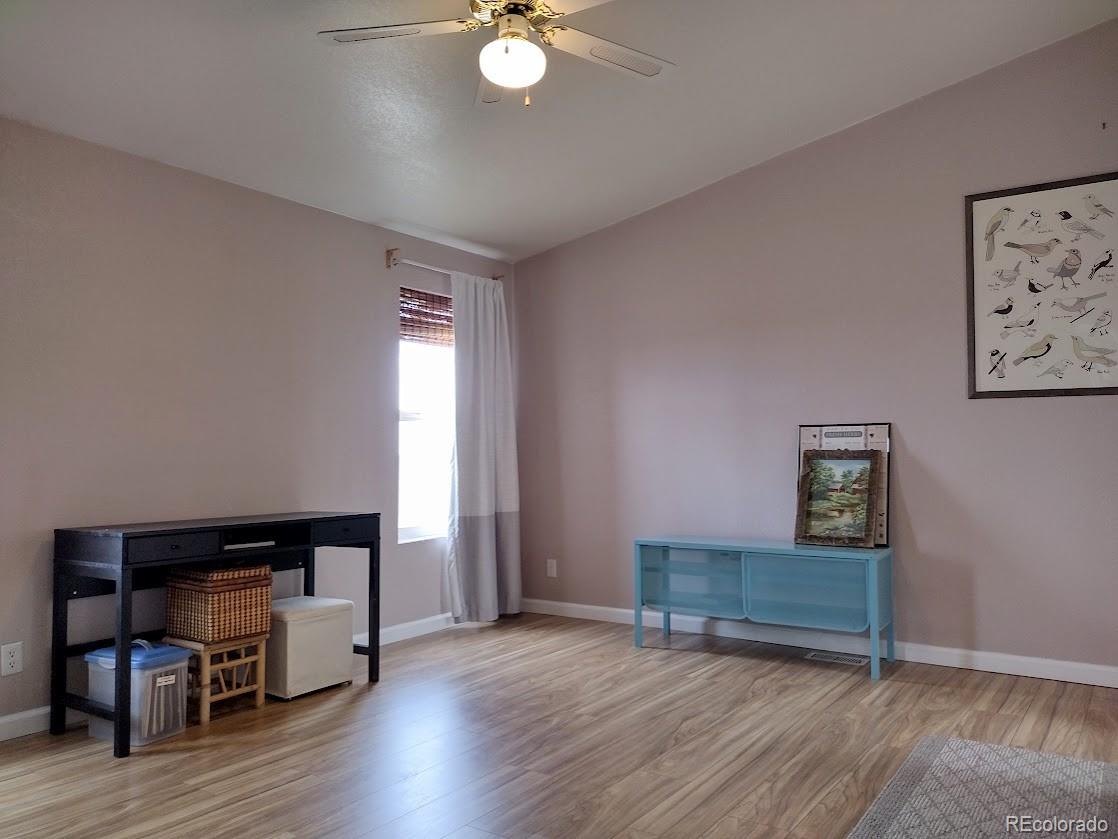 10421 West Lane Rye, CO 81069 - Photo 11 of 34 a view of a livingroom with furniture and wooden floor