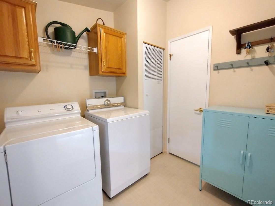 10421 West Lane Rye, CO 81069 - Photo 18 of 34 a utility room with dryer and washer