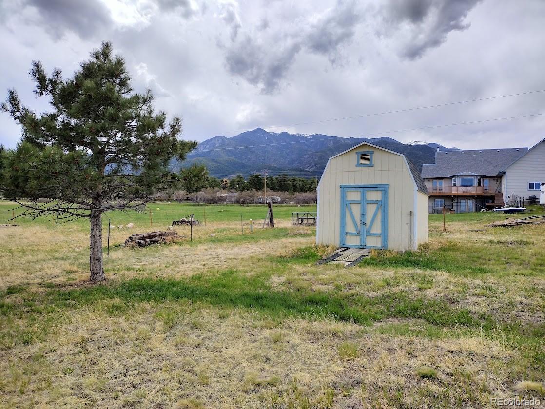10421 West Lane Rye, CO 81069 - Photo 28 of 34 a view of a yard with an trees