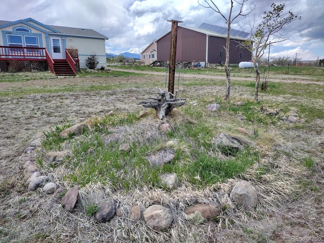 10421 West Lane Rye, CO 81069 - Photo 30 of 34 a backyard of a house with lots of green space