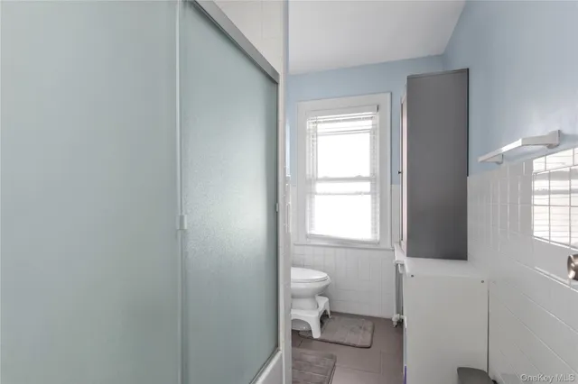 a bathroom with a toilet