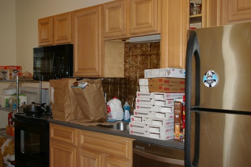 12 Ransom Road, Unit 6 Boston, MA 02135 - Photo 3 of 16 a kitchen with refrigerator and cabinets