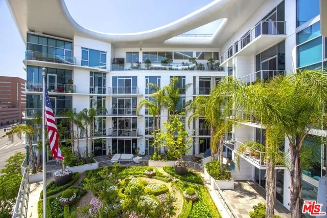 a view of multiple house with a swimming pool